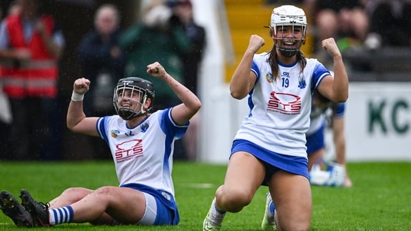Waterford players Abby Flynn (L) and Róisín Kirwan celebrate the semi-final win