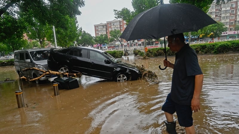 A flooded street after heavy rains in Beijing's Mentougou district on Saturday