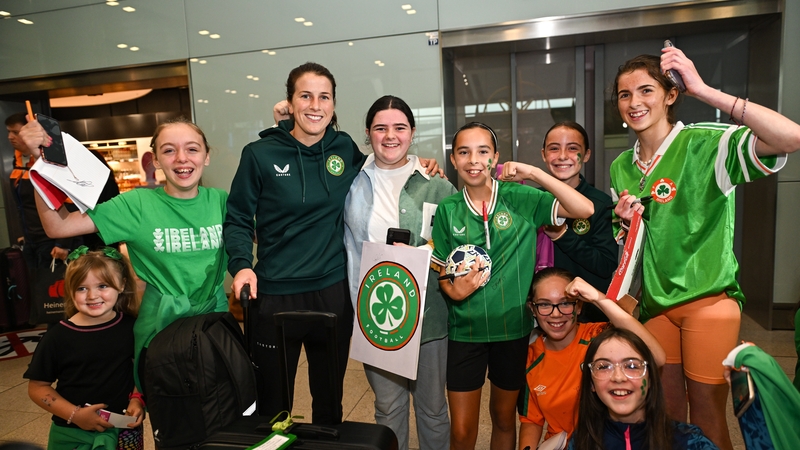 Niamh Fahey with supporters at Dublin Airport on the Republic of Ireland's return from the World Cup in Australia (Pics: Sportsfile)