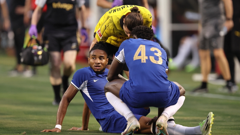 Christopher Nkunku of Chelsea goes down with an injury