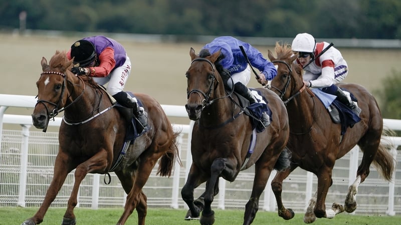 Tom Marquand riding Desert Hero (left) to victory