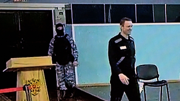 Russian opposition figure Alexei Navalny arriving to listen to his verdict over a series of extremism charges at the IK-6 penal colony