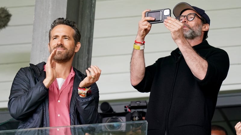 Ryan Reynolds and Hugh Jackman at Saturday's match Photos: Press Association