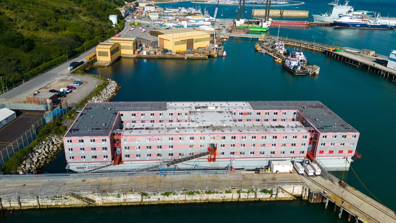 The Bibby Stockholm immigration barge moored at Portland Port, Dorset