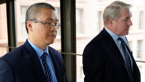 Tou Thao (L) pictured with his lawyer Robert Paule