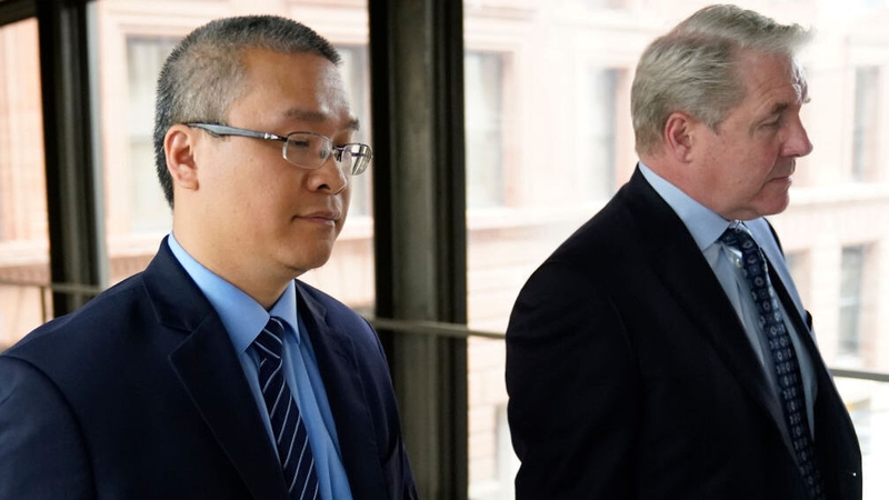 Tou Thao (L) pictured with his lawyer Robert Paule