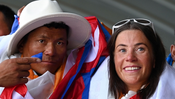 Kristin Harila (R) and her Nepali guide Tenjin 'Lama' Sherpa became the fastest people to summit all 14 of the world's 8,000-metre mountains