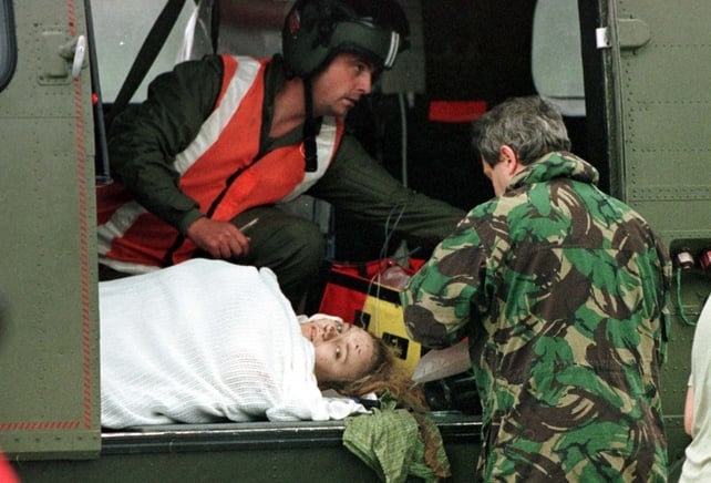 One of the hundreds of people injured in the blast is airlifted from Tyrone County Hospital to the Belfast Royal Hospital. Initial tolls put the number injured at over 220, but this would rise to 300