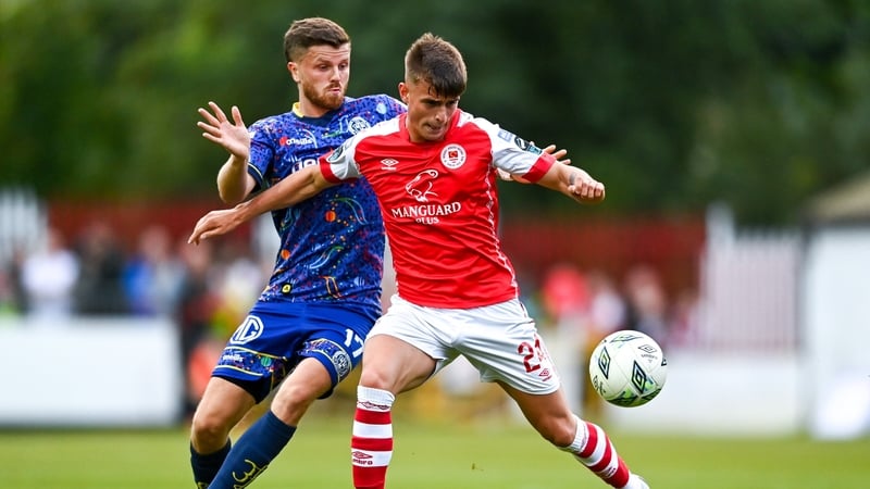 Adam Murphy of St Patrick's Athletic in action against Adam McDonnell