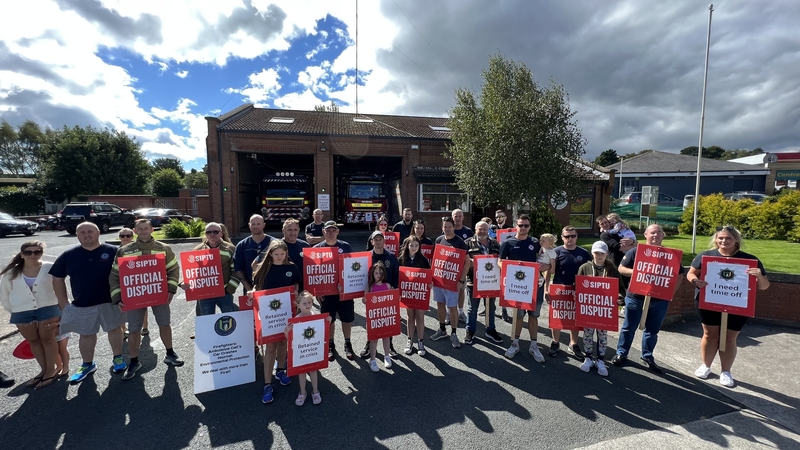 Retained firefighters and supporters at a protest in Greystones, Co Wicklow, this morning