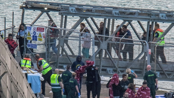 Paramedics wait in Dover to tend to assist migrants picked up at sea while attempting to cross the English Channel
