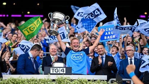 Carla Rowe, the Dublin captain, lifts the Brendan Martin Cup