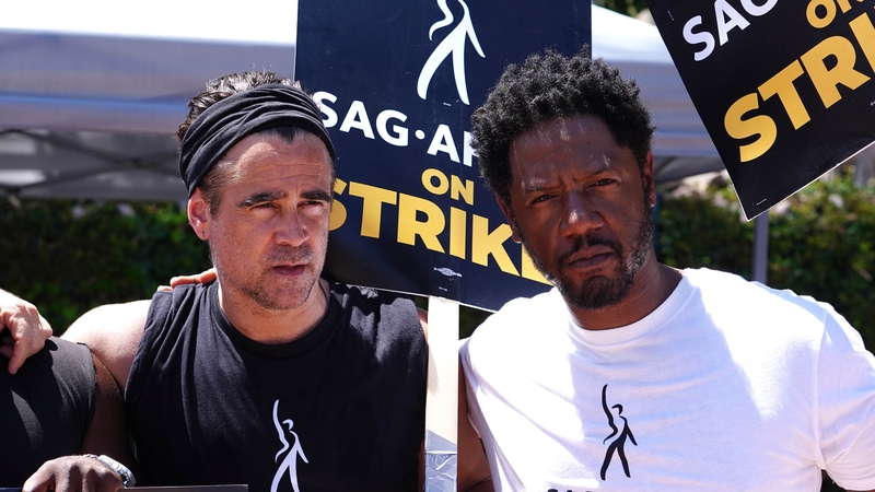 Colin Farrell and fellow actor Tory Kittles on the picket line in Los Angeles last month