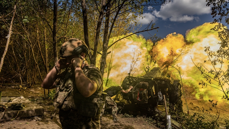 Ukrainian soldiers fire with D-30 artillery at Russian positions in the direction of Klishchiivka, in Donetsk Oblast