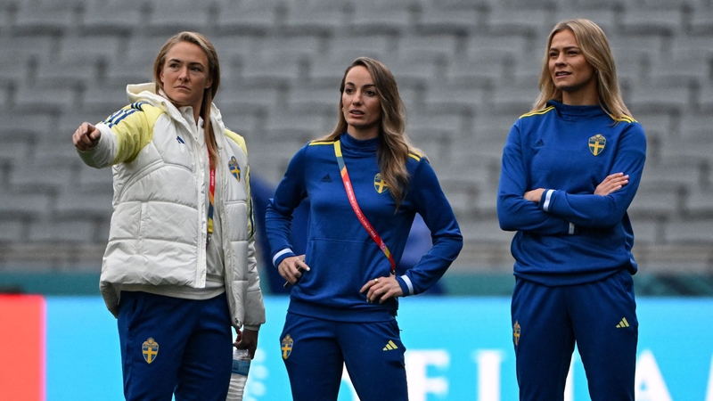 Sweden's Fridolina Rolfo (R) and Kosovare Asllani (C) take in their surroundings at Eden Park