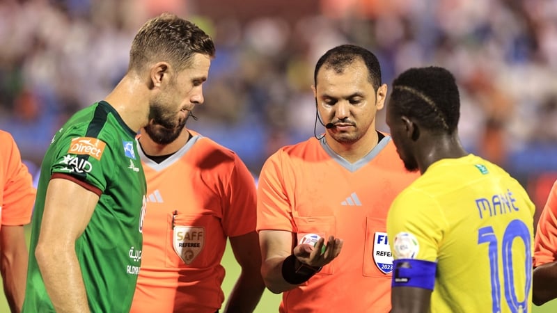 Keeping it riyal: former Liverpool team mates Jordan Henderson of Al-Ettifaq and Sadio Mane of Al-Nassr prior to the Saudi Pro League match between the teams yesterday. Photo: Essa Doubisi/Getty Images