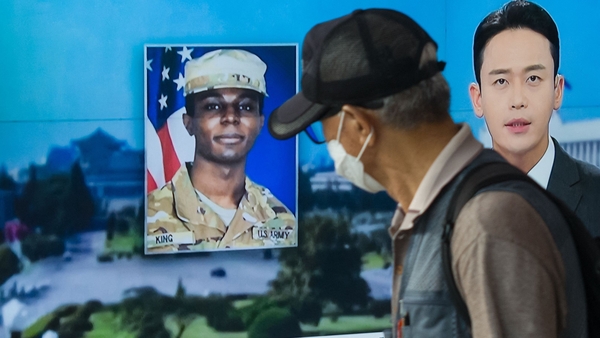 A TV in Seoul, South Korea, showing a news broadcast featuring a photo of US soldier Travis King, who ran across the border into North Korea while part of a tour group visiting the demilitarized zone