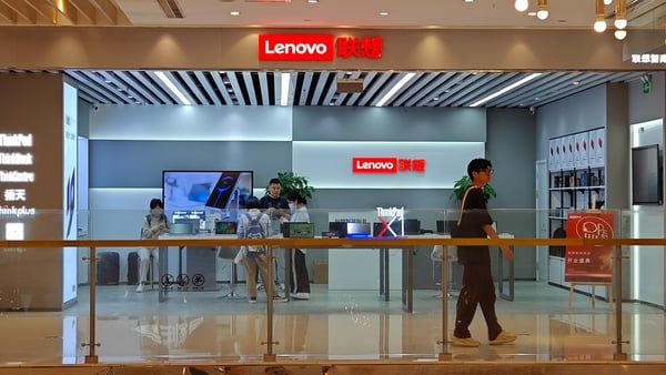 Customers shop at a Lenovo computer shop in Shanghai