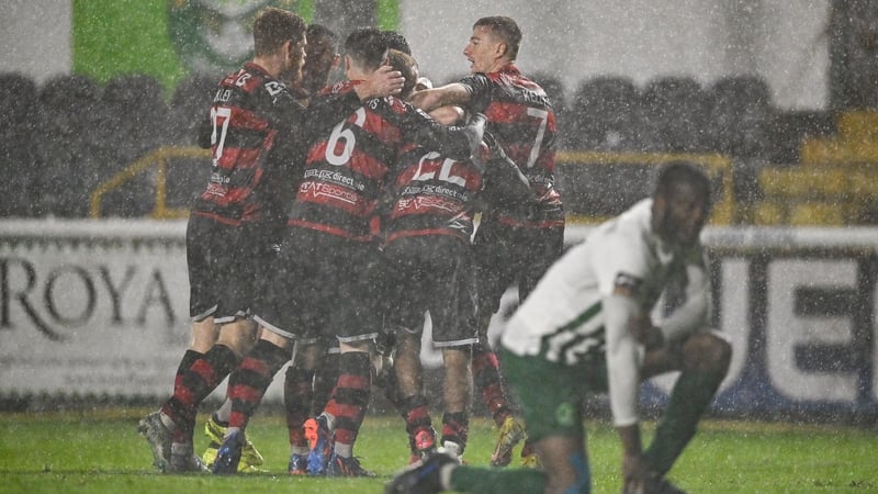 Dundalk players celebrate their late winner