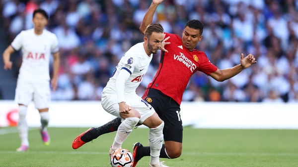 James Maddison (L) holds off Casemiro