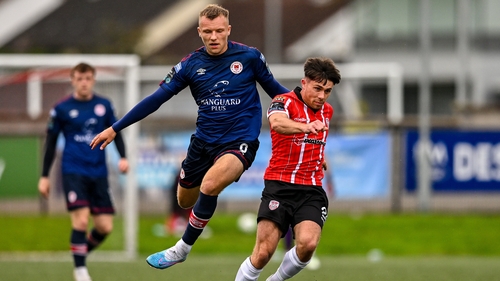 Adam O'Reilly of Derry City in action against Jamie Lennon