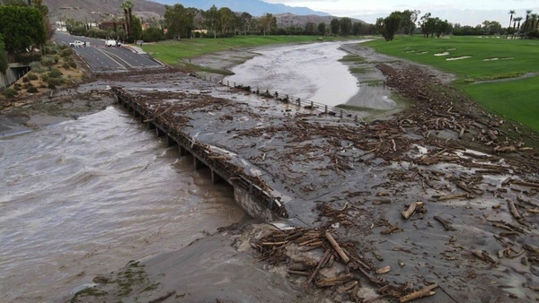 Debris covers a road following heavy rain in Rancho Mirage, California
