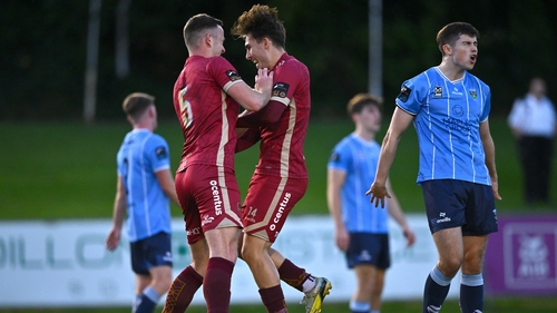 Ronan Manning celebrates with Killian Brouder after scoring Galway's fourth goal in UCD