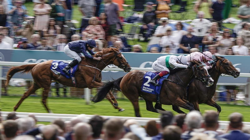 Warm Heart (far side, pink) and James Doyle hold off Free Wind at York