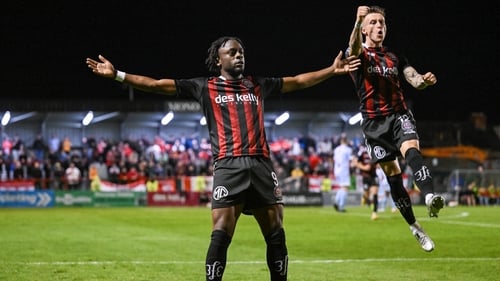 Jonathan Afolabi celebrates after scoring Bohemians second goal with team-mate Danny Grant
