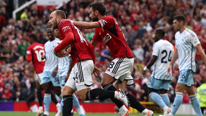 Christian Eriksen grabs the ball after scoring United's first goal on Saturday