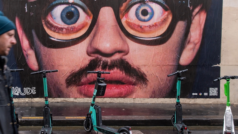 E-scooters, operated by Tier Mobility and Lime, parked in a dedicated scooter bay in Paris