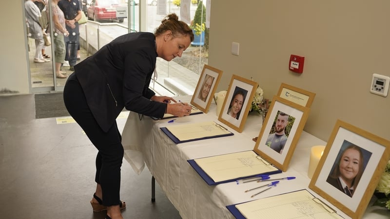People line up to sign the books at County Hall in Clonmel