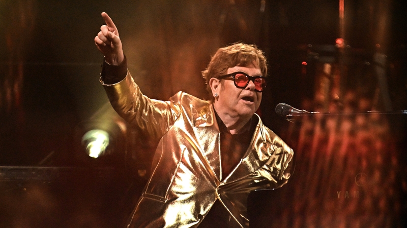 Elton John is "back at home and in good health"