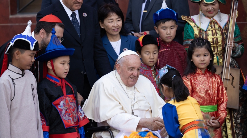 Pope Francis was greeted by children on his first day in Mongolia