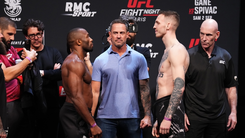 Ange Loosa (L) and Rhys McKee face off during the UFC Fight Night weigh-in in Paris