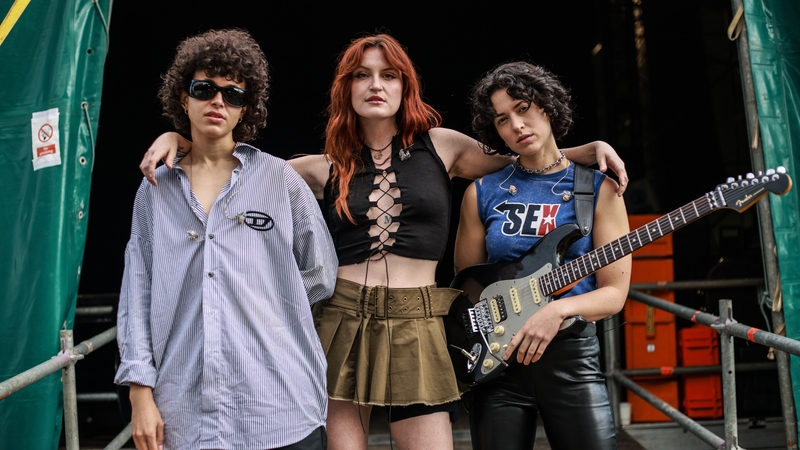 (L-R) MUNA's Naomi McPherson, Katie Gavin and Josette Maskin as they prepare to take to the stage in Stadbally Photo: Getty Images