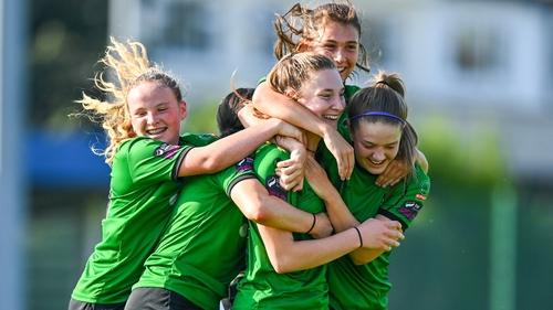 Ellen Dolan is mobbed after her goal for Peamount United