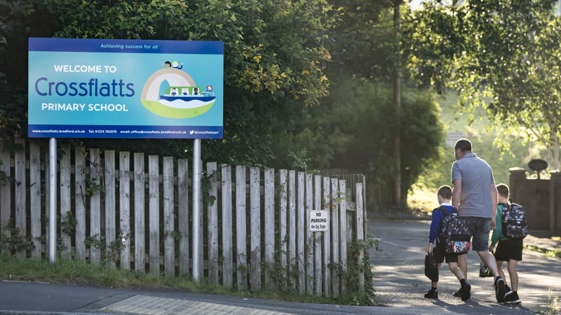 Children arrive at Crossflatts primary in Bradford which has been affected with Raac
