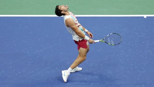 Carlos Alcaraz reacts after victory over Italy's Matteo Arnaldi
