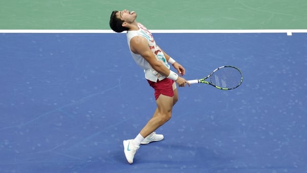Carlos Alcaraz reacts after victory over Italy's Matteo Arnaldi