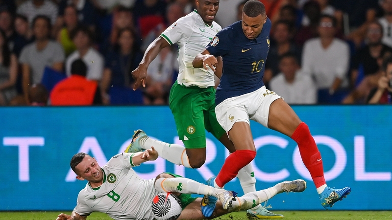 Alan Browne makes a tackle 7 on Kylian Mbappé