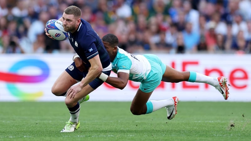 Finn Russell (L) scored Scotland's three solitary points against South Africa