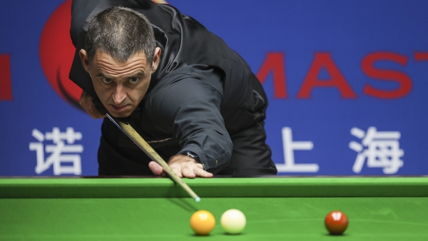 Ronnie O'Sullivan lines up a shot