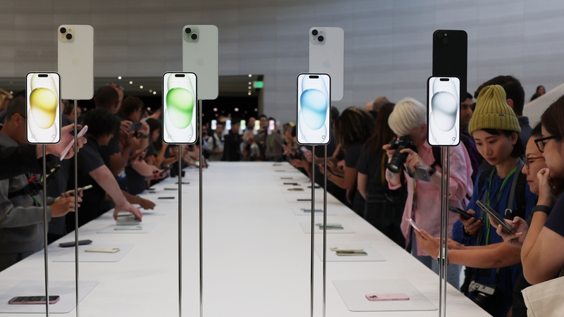 Attendees look at brand new Apple products