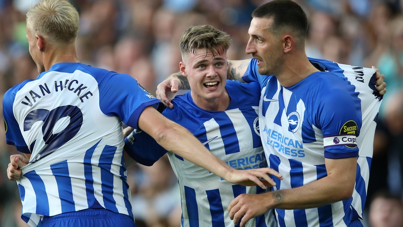 Ferguson is mobbed by team-mates against Newcastle