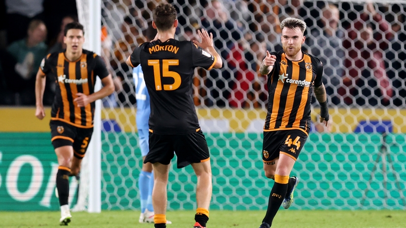 Aaron Connolly celebrates with team-mate Tyler Morton after his equaliser
