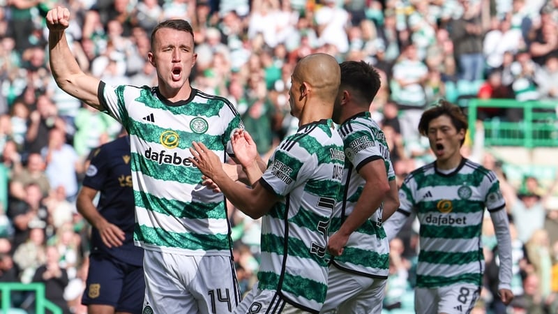 Celtic's David Turnbull celebrates scoring his penalty