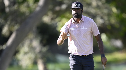 Sahith Theegala acknowledges the crowd at the 14th green at Silverado Resort and Spa