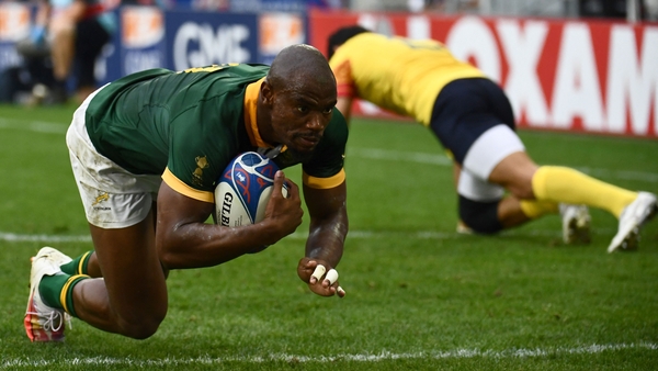 South Africa's winger Makazole Mapimpi dives over for a try
