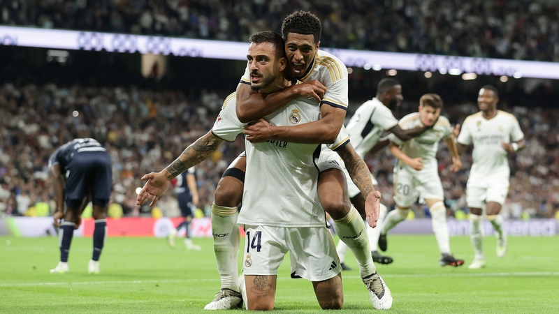 Joselu celebrates scoring the winner with Jude Bellingham